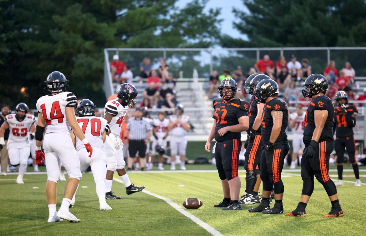 The EHS offense sets up at the line of scrimmage against Triad during the scrimmage Aug. 23.