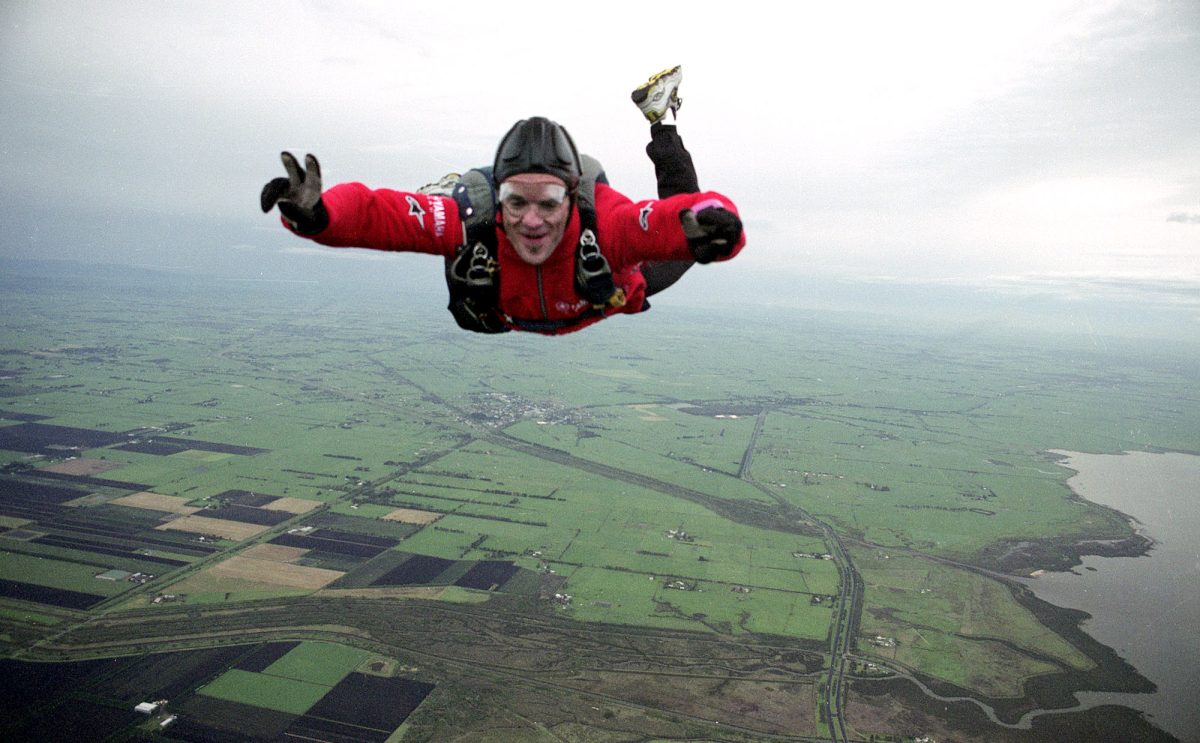 Spanish MotoGP rider Carlos Checa skydives at the Tooradin Airfield near Phillip Island, Australia, Wednesday, Oct. 13, 2004. Checa will line up on the grid on Sunday, Oct. 17 for the Australian Motorcycle Grand Prix. (AP Photo/Commando Skydivers, Bill Bleazard, HO)