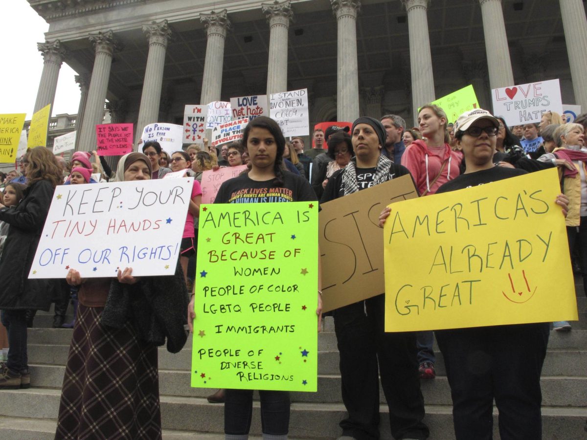 Thousands of women gather for the Stand Up Rally for women and minority rights on Saturday, Jan. 21, 2017, a day after Donald Trump's first inauguration, in Columbia, S.C. 