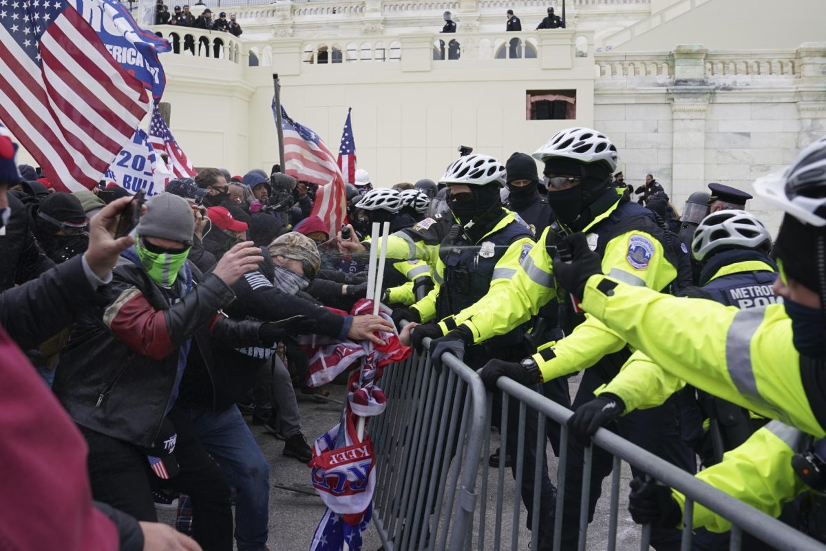 Rioters loyal to President-elect Donald Trump clash with police at the U.S. Capitol on Jan. 6, 2021, in Washington.