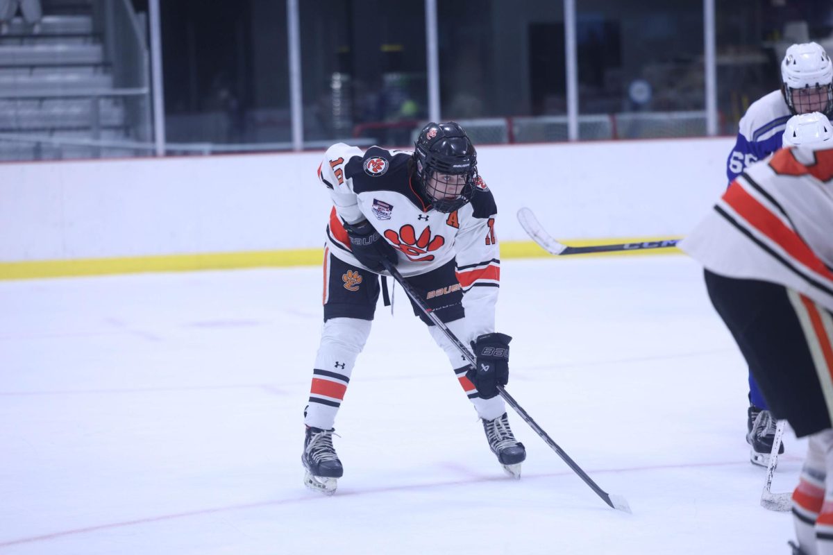 Senior Grant Huneke waits a faceoff during the 7-3 win over Columbia Nov. 11.