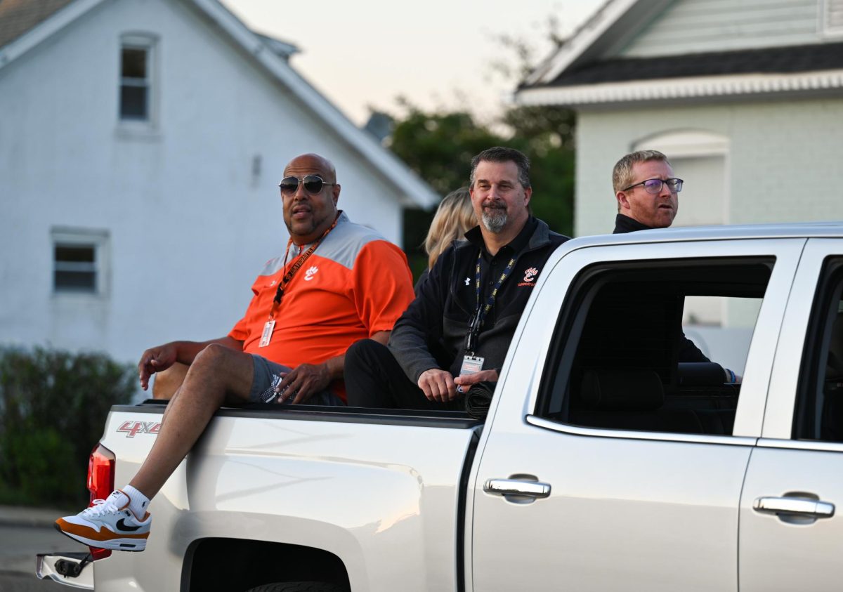 Mr. Fox rides in a truck with other members of the EHS administration during the Homecoming parade Oct. 9.