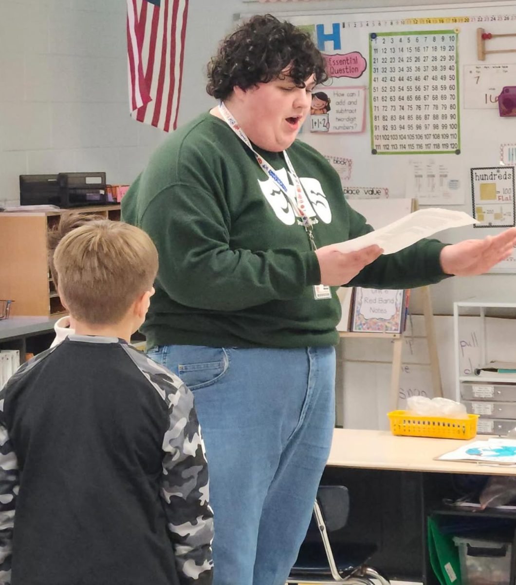 Henry Winslow student teaching a first grade class curtesy of Ashley Melton